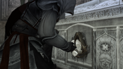 Ezio opening the sarcophagus