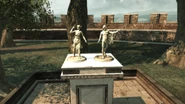 A statuette of Diana beside Apollo in Monteriggioni