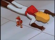 Zeus stands beside his body