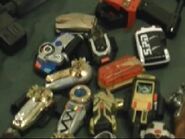 Most of the Morphers, except 1 Left Zeonizer, the Dino Buckler, the Battlizer, a Thunder Morpher, and an unknown morpher.