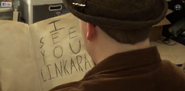 Linkara finds the words "I SEE YOU LINKARA" in the book.