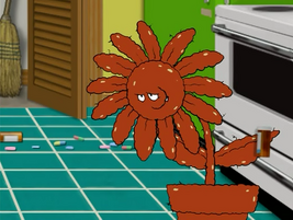 Meatwad taking on shape of a potted flower after ingesting drugs