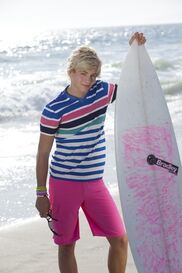 Ross and a surfboard