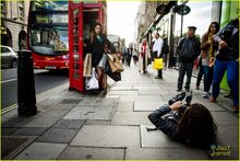 Laura out of phone booth in London