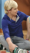 LOOK 2: Dressier with a Blue Sweater and Grey Pants
