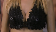 Machine gun barrels coming out of Britney's bra, revealing her to be a fembot