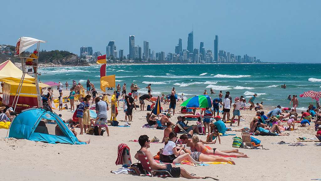 GOLD COAST, AUSTRALIA - MARCH 25, 2008: People walk in Surfers Paradise,  Gold Coast, Australia. With more than 500,000 people, it is the 6th most  popu Stock Photo - Alamy