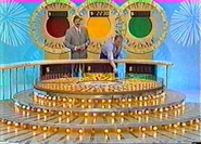 A contestant spinning the Golden Wheel in a 1990 episode