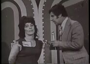 Gary meadows explaining the clock game with contestant on price is right austraila