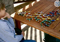 Asperger's boy plays with magnets