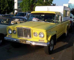 A Jeep Gladiator equipped with a camper shell.