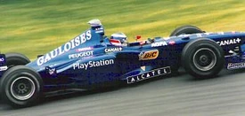 Olivier Panis driving for the Prost Grand Prix team in Montreal in 1998.