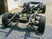 Chassis with suspension and exhaust system