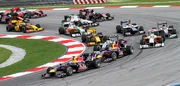  takes the lead at the first corner of the race.