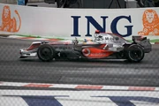 Hamilton celebrates his on-track victory. It was to be short-lived.