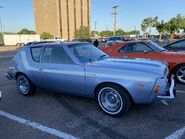 1974 AMC Gremlin X and Levi's package in Diamond blue at 2021 AMO 2of6