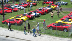 800px-Ferrari parking lot at USGP 2005