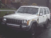 A rusty 1980s Cherokee