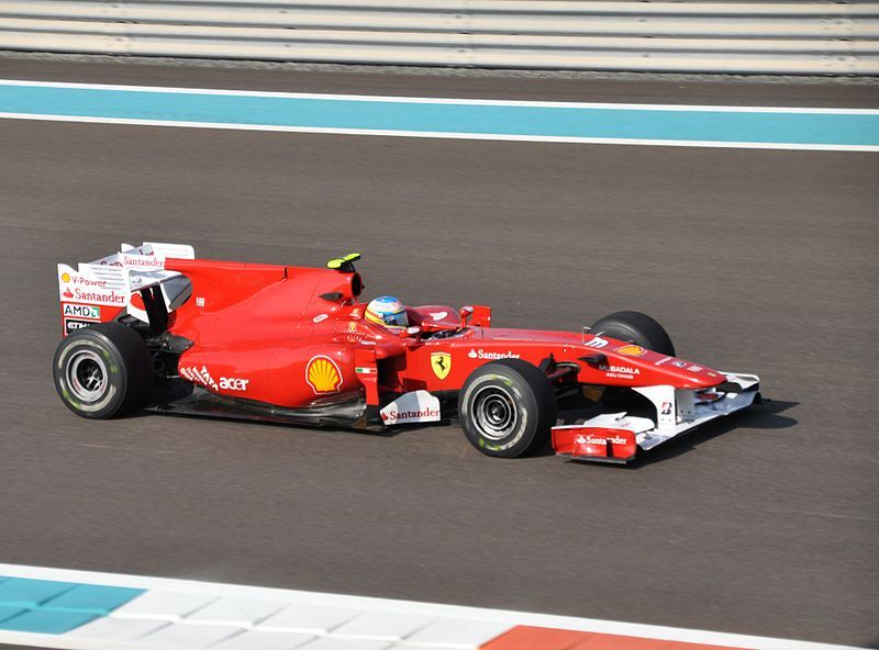 Ferrari's Fernando Alonso from Spain, right, drives his car in between the  pack during the European Formula One Grand Prix at Valencia street circuit,  Spain, Sunday, June 24, 2012. The race takes