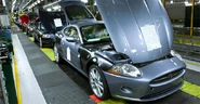 Jaguar XKs being assembled.