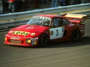 Stommelen driving a  in 1977.