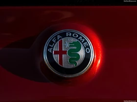 The restyled company logo, which debuted with the new Giulia