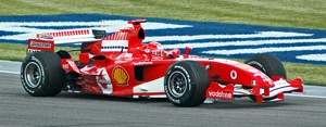 Michael Schumacher in practice at the . Note the Bridgestone branding on the rear wing endplate, the Bridgestone's 'B' logo on the front wing, just under the nosecone and on the side winglet just before the rear wheel