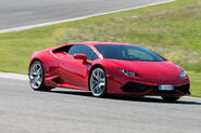 2015-lamborghini-huracan-lp-610-4-track-red-front-three-quarters-in-motion