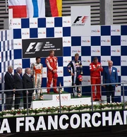 The post-race podium ceremony. From left to right: , ,  and .