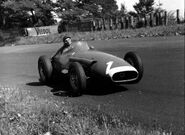 Juan Manuel Fangio securing the 1957 F1 World Champions Title in the Maserati 250F.