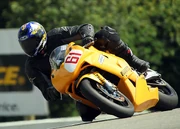 A motorcycle races at Mosport