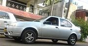 220px-An Indian cab (Ford Ikon). Cropped for better representation