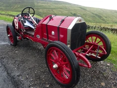 Bright red Fiat S61 Corsa