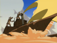 Maîtres du sable utilisant un voilier de sable