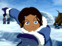 Young Katara throwing a snowball