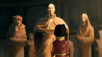 Jinora looking at Aang's statue