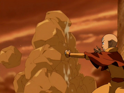 Aang creates earth wall