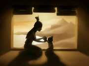 Ozai and his son, Zuko, as a baby