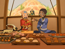 Aang and Katara eat