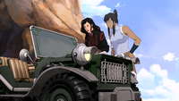 Asami and Korra look at a map