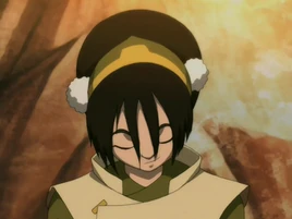 Toph smiling