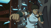 Korra shatters ice projectiles