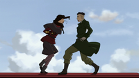 Asami charging a Kuvira agent