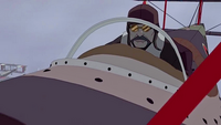 Hiroshi piloting a biplane