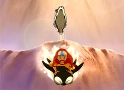 Aang en Katara sleeën op pinguïns