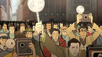 A crowd of  features people with neutral clothing (e.g. brown; right), multicolored clothing (e.g. green-red; center), and one color clothing (e.g. blue; left).