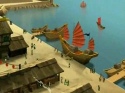 Van grote hoogte zien we enkele straten en het piratenschip aan de kade.