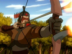 Schutter met brandende pijl richtend in de boog.