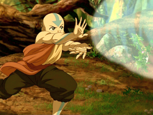 Aang testing his airbending on the lion turtle