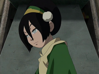 Toph looks away